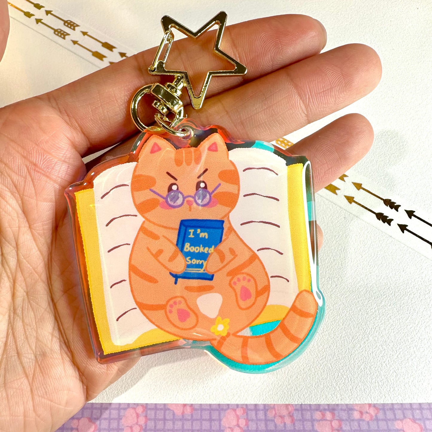 The Bookworm Cat Rainbow Acrylic Keychain